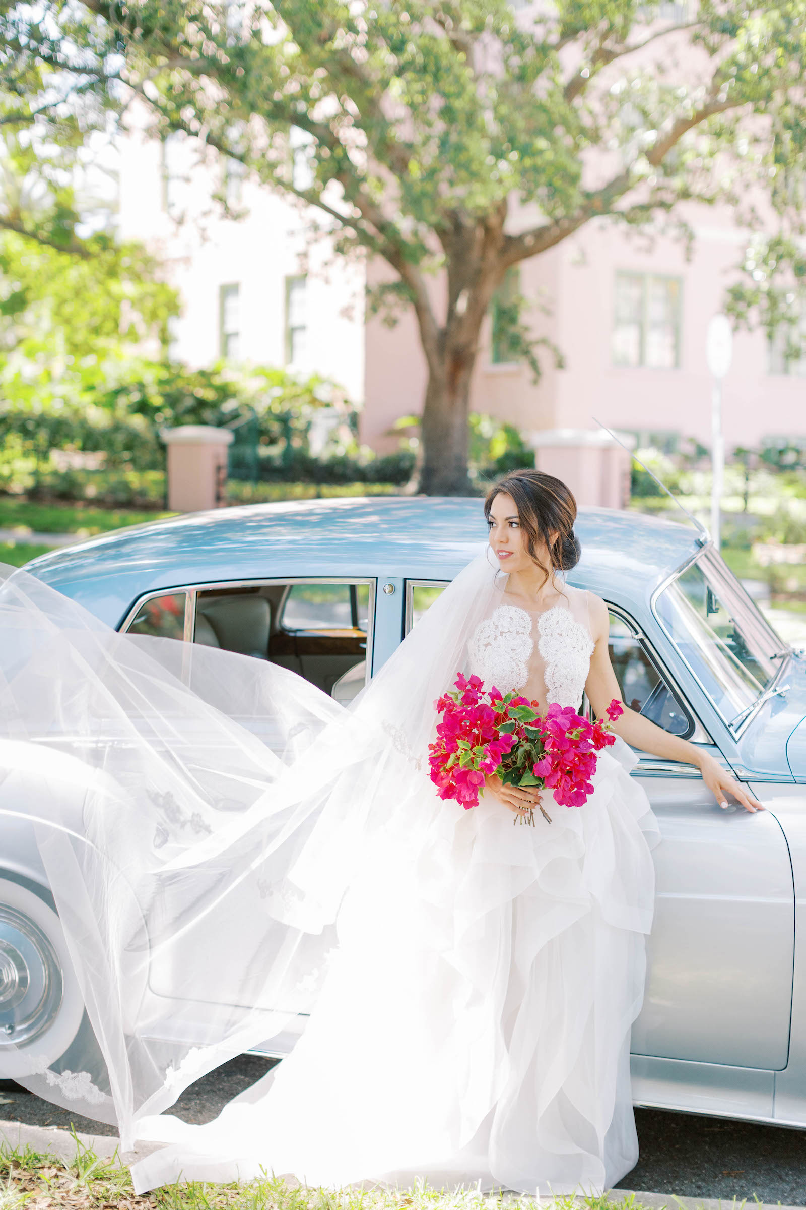 Vibrant Pink Downtown St Pete Wedding with Classic Getaway Car