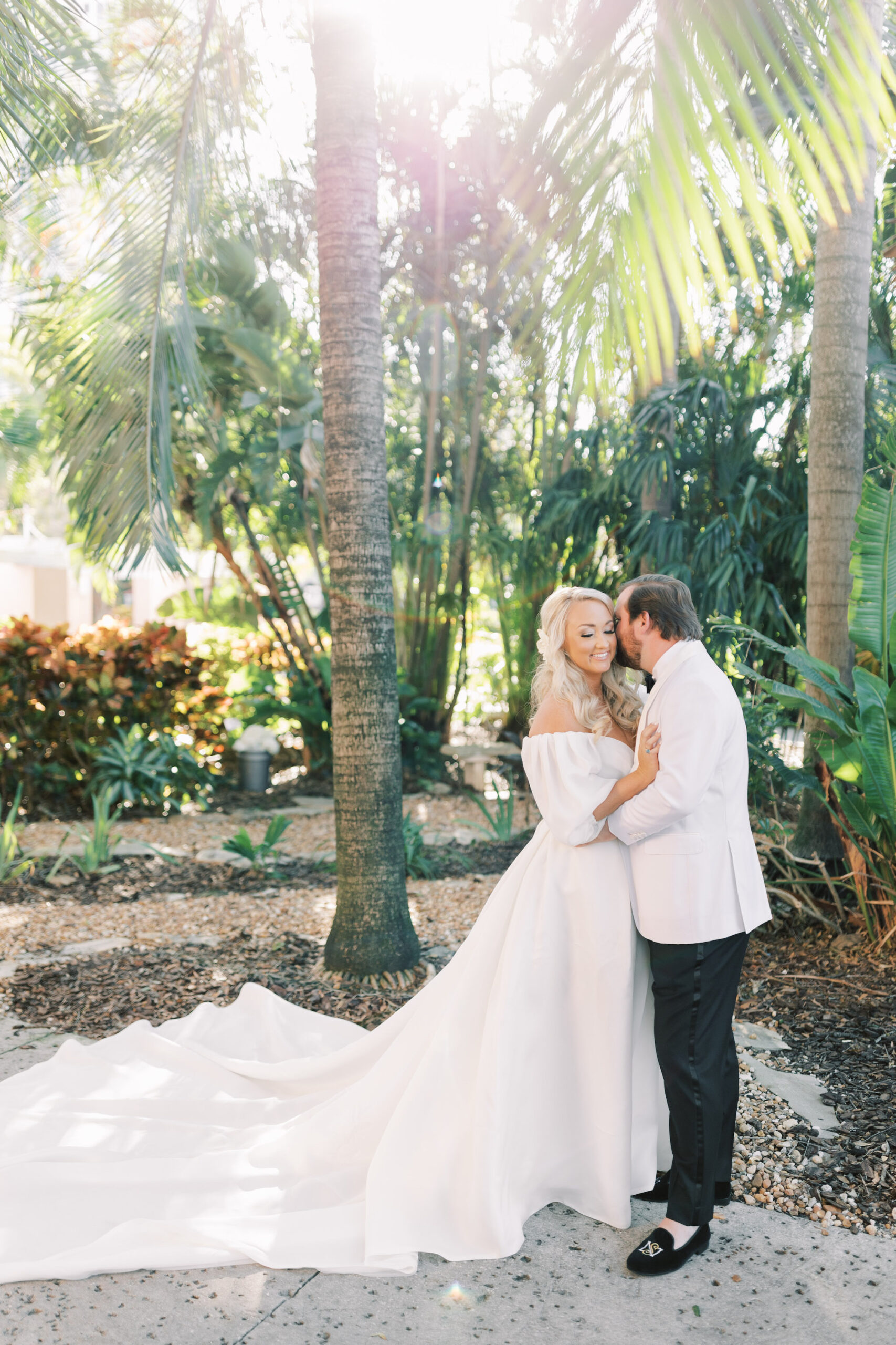 White Off-The-Shoulder Poof Sleeve A-Line Wedding Dress Ideas | White and Black Tuxedo Black Tie Inspiration | Tampa Bay Planner Parties A' La Carte