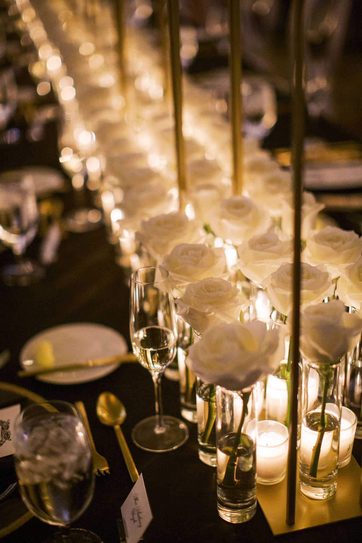 Classic White and Black Wedding Reception Inspiration | White Roses, Bud Vases, and Candlelight Centerpiece Ideas | Tampa Bay Planner Parties A La Carte